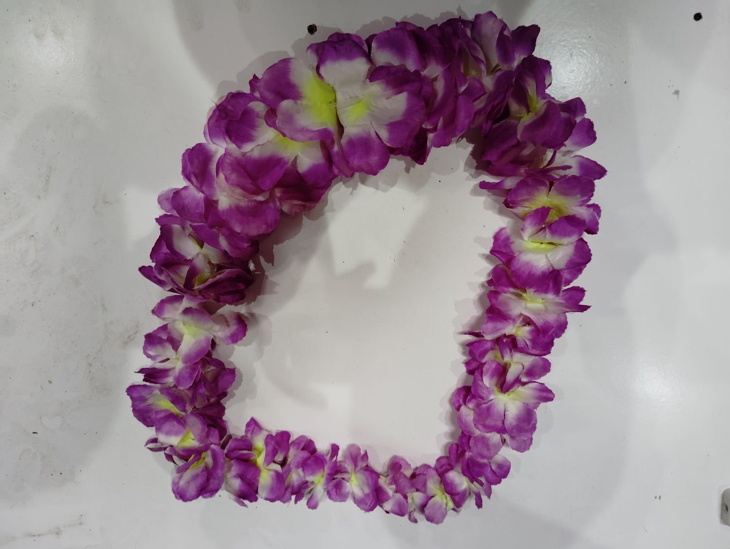 Collares y pulseras de flores de plastico